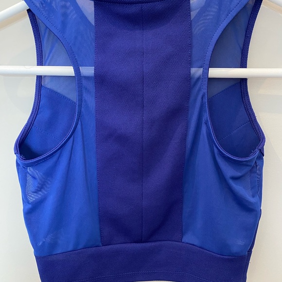 Blue cropped top with bandage features. - Picture 4 of 4